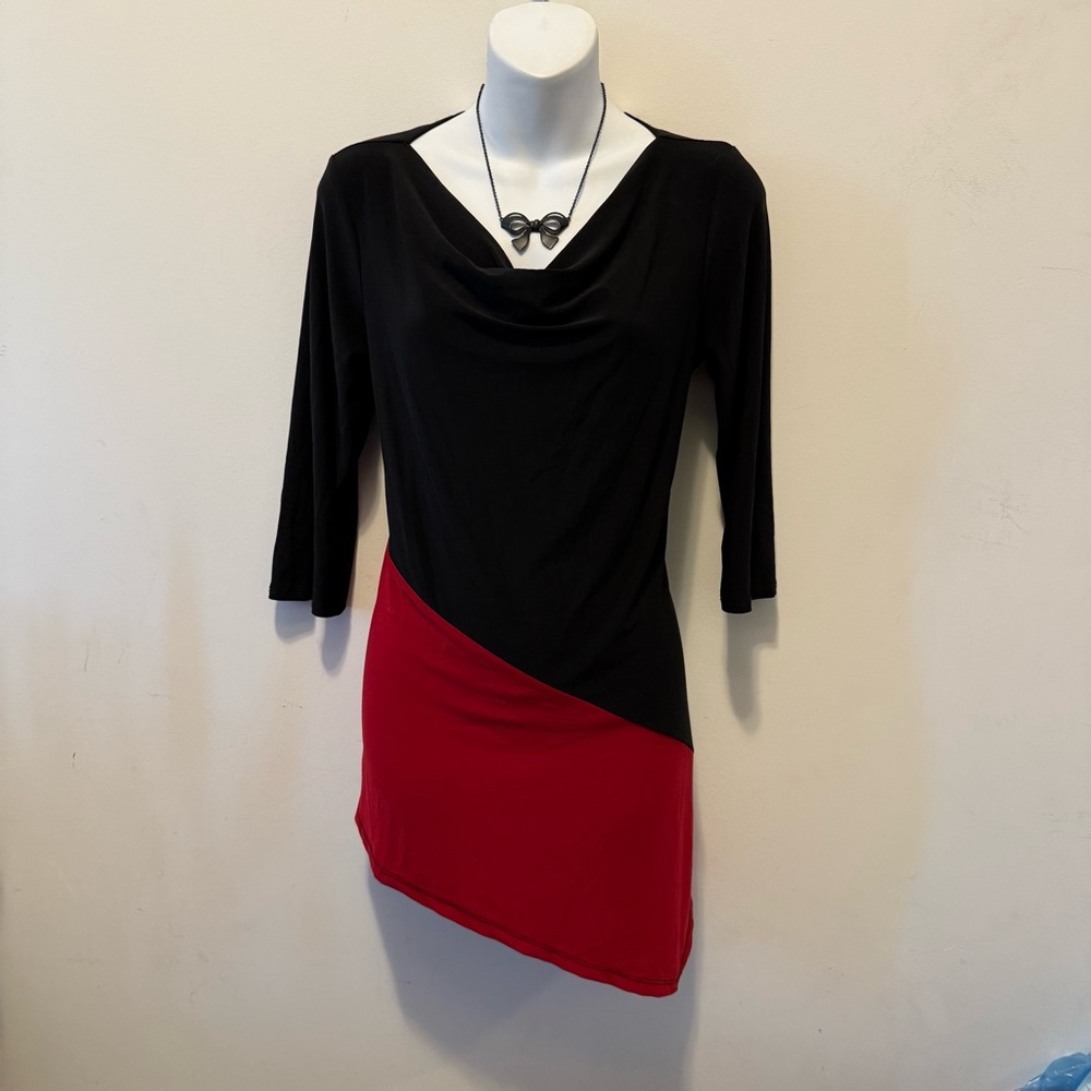 Vintage asymmetrical color block long top

No size tag best fit Large

Brand: